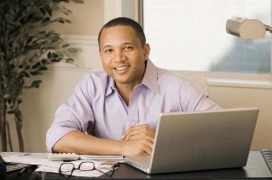 man in front of laptop