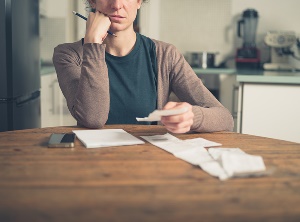 woman worried about expenses