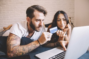 young couple checking credit